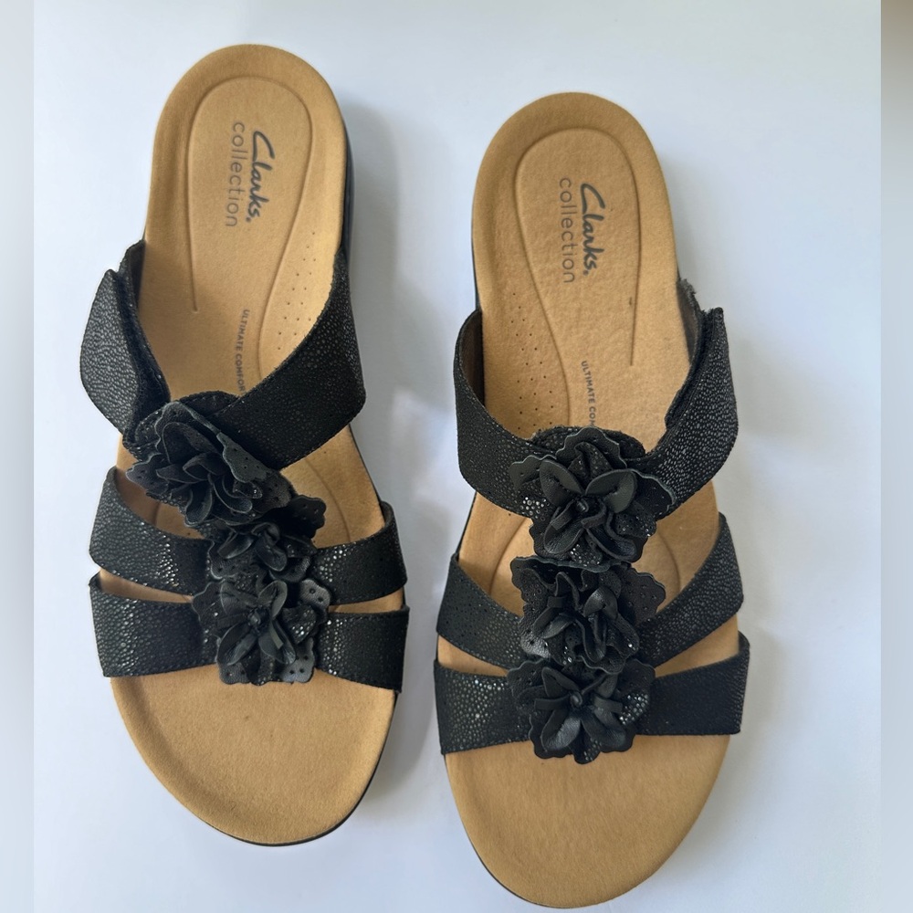 Clark Women’s Laurieann Jude Flat Sandal in Black
